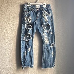 One tablespoon distressed style denim jeans.(24)